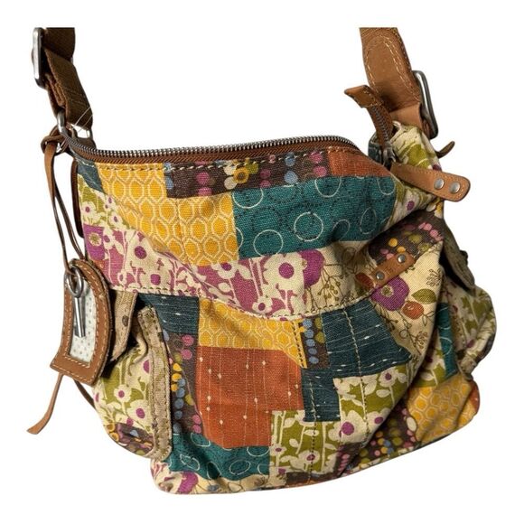 Fossil 2000's Y2K Slouchy Crossbody Bag
11.5" W, 11" H, 4.5" D patchwork - Picture 12 of 12